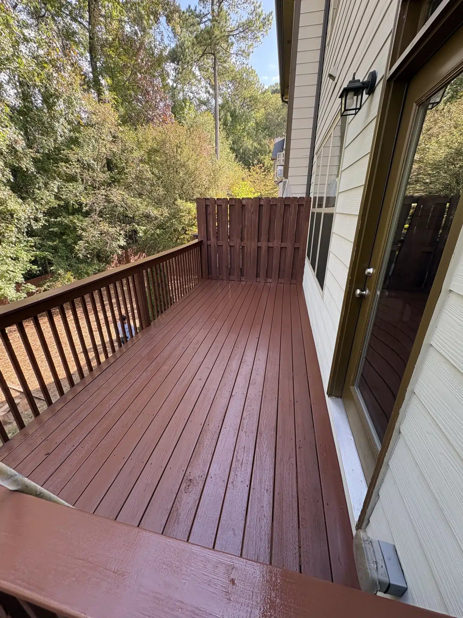 Balcony deck stained a deep red — MG Barillas Painting