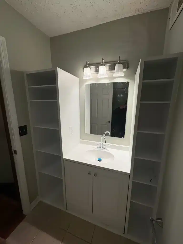 Bathroom vanity with built-in shelving painted white — MG Barillas Painting