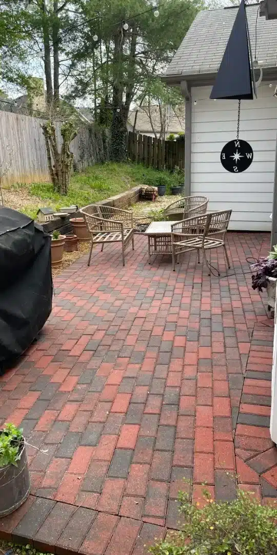 After: Brick patio clean and bright after pressure washing