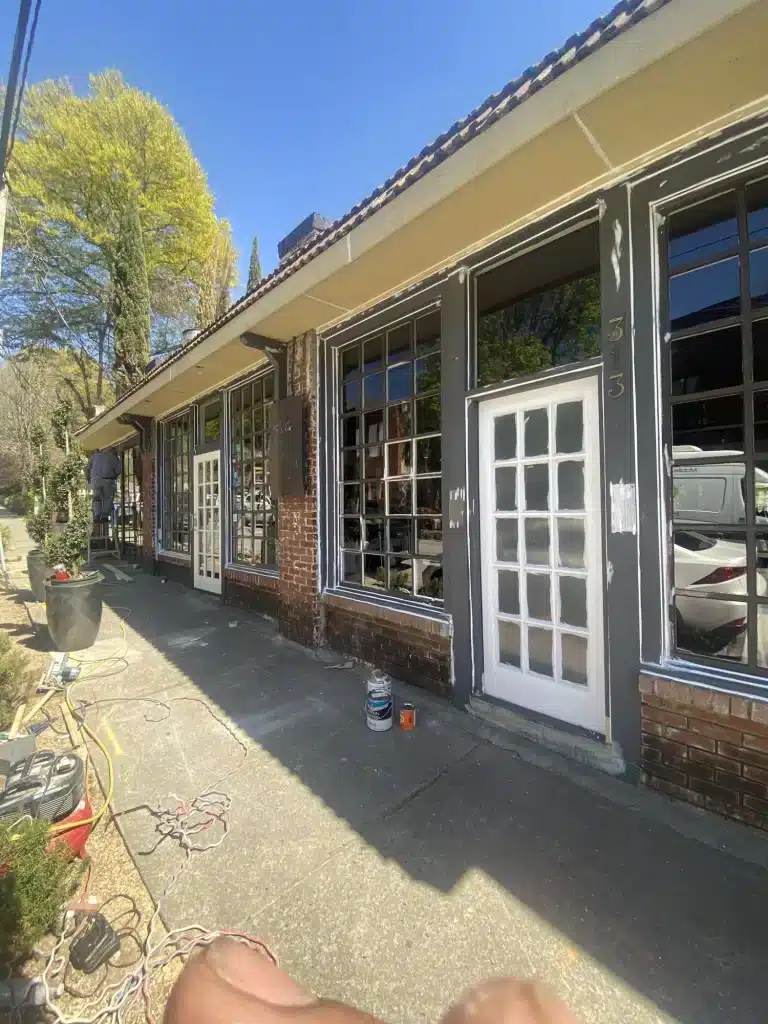 Commercial storefront with freshly painted trim and doors — MG Barillas Painting