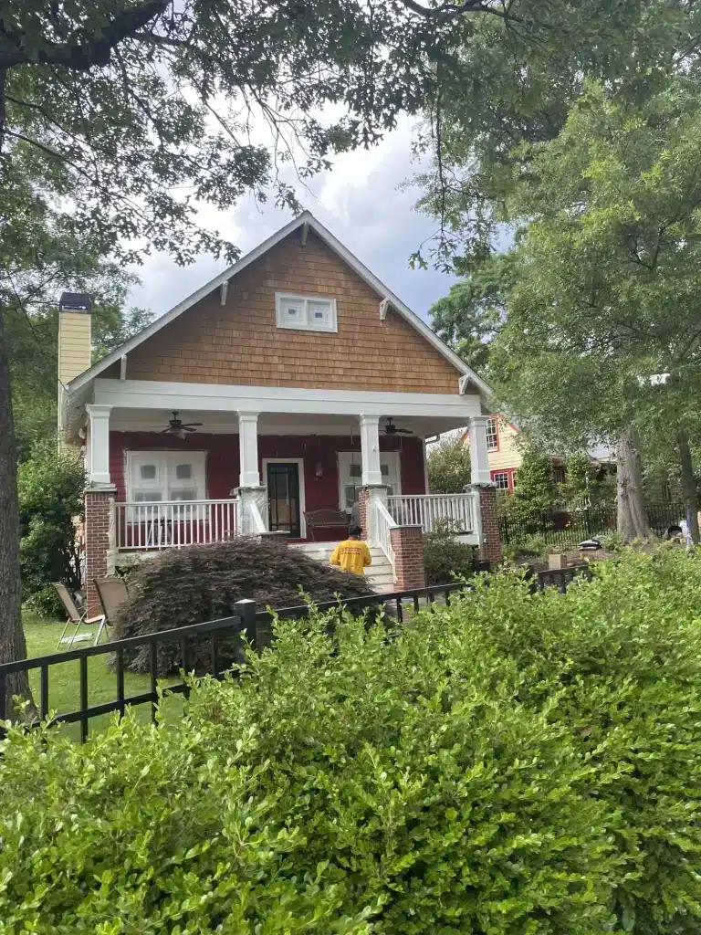 Craftsman bungalow with red door and front porch — MG Barillas Painting