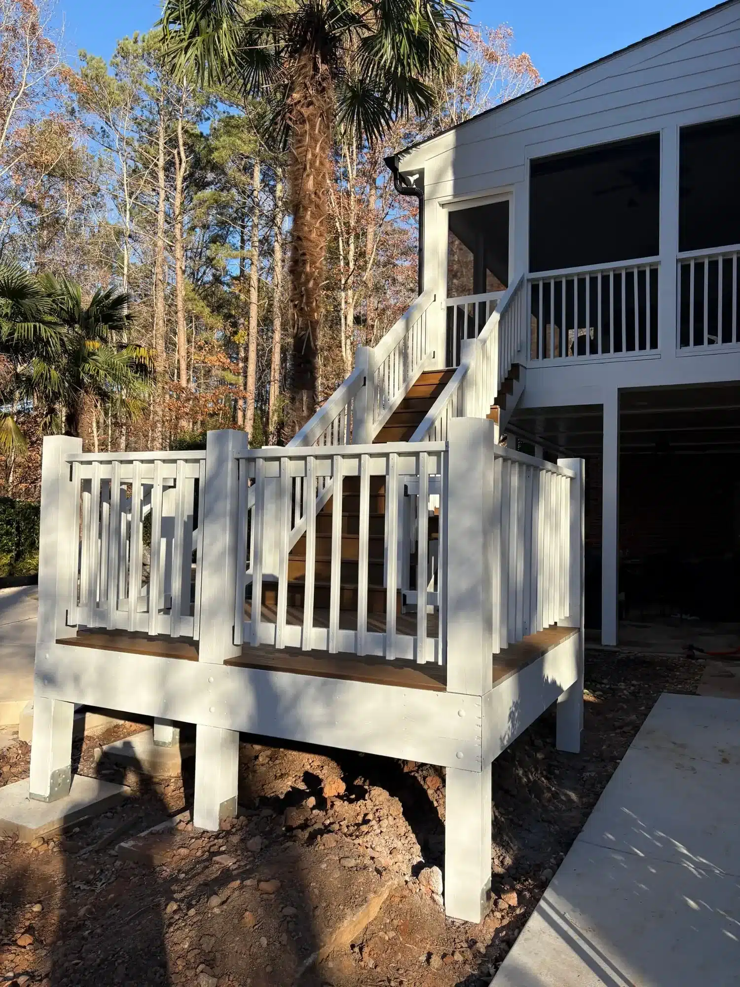 After: Deck landing, railings and stairs painted crisp white