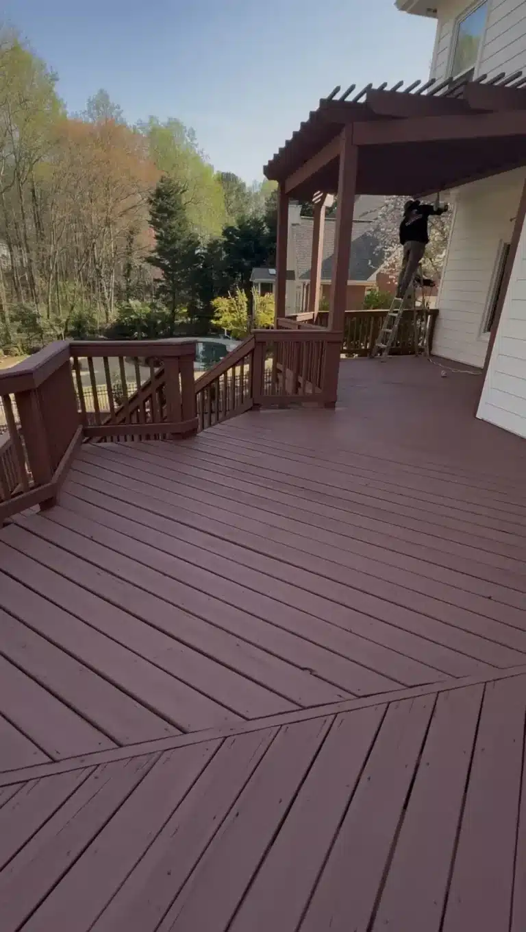 Large deck and pergola stained a rich red-brown — MG Barillas Painting