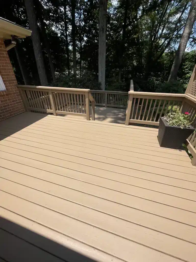Freshly stained tan deck with planters — MG Barillas Painting