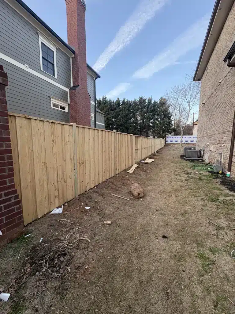 New wood privacy fence ready for stain — MG Barillas Painting