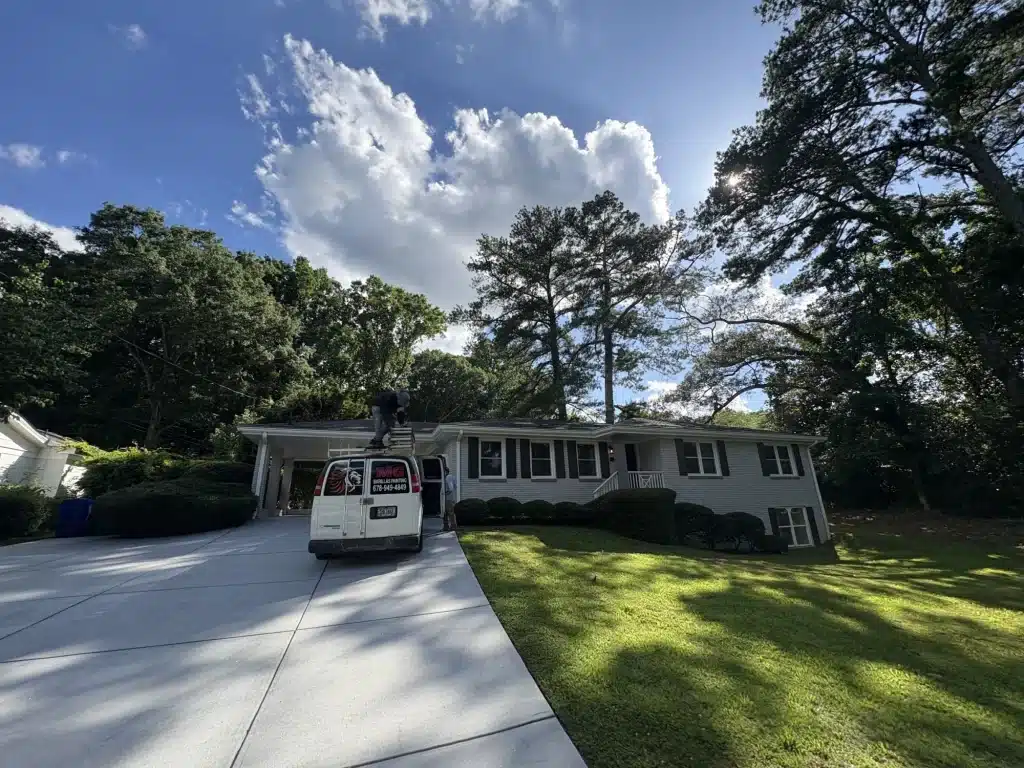 Ranch home exterior repaint with the MG Barillas work van in the driveway — MG Barillas Painting