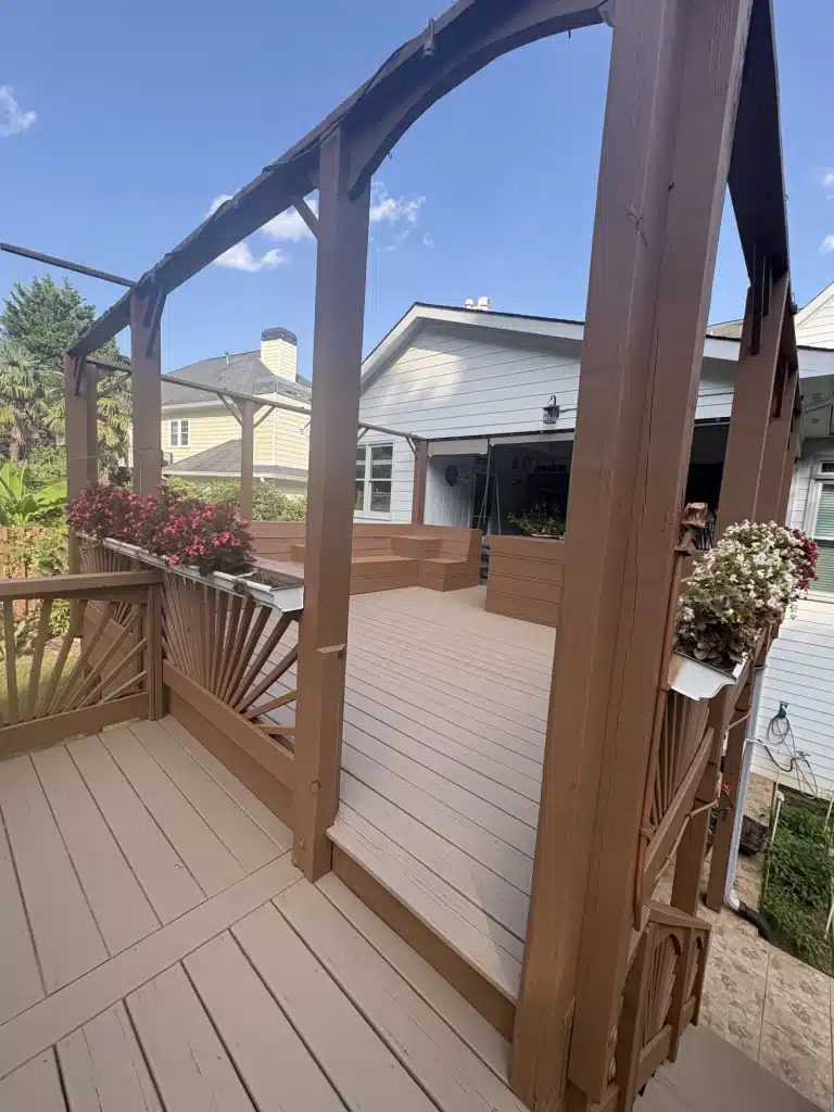 Stained deck with pergola posts and flower boxes — MG Barillas Painting