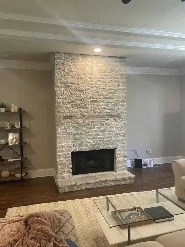 Stone fireplace painted white — MG Barillas Painting