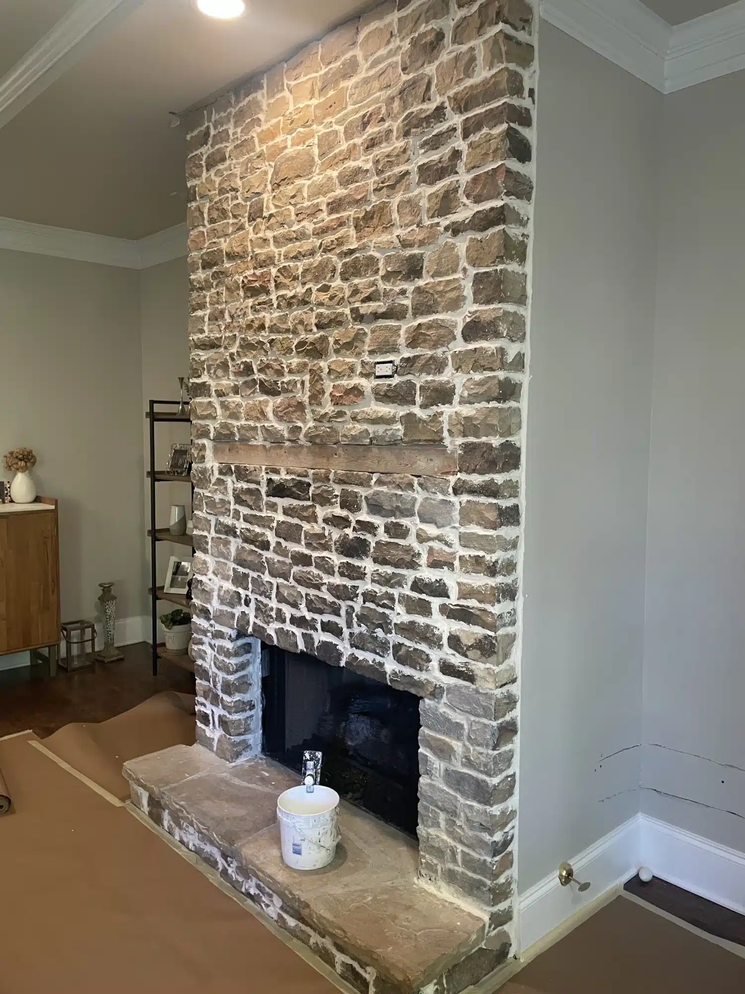 Before: Stone fireplace wall before painting
