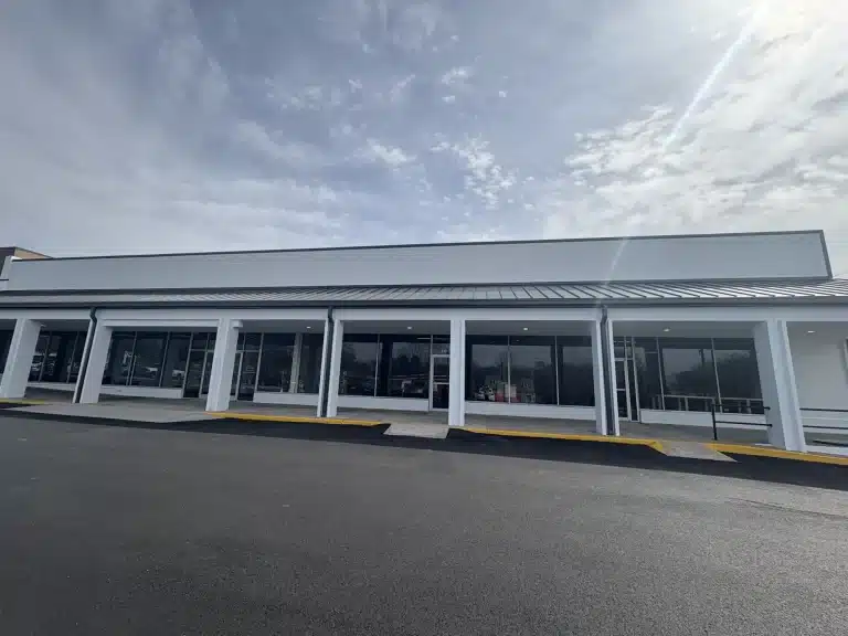 Strip center storefronts after a commercial exterior repaint — MG Barillas Painting