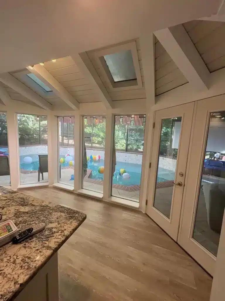 Sunroom with beams, trim and windows painted white — MG Barillas Painting